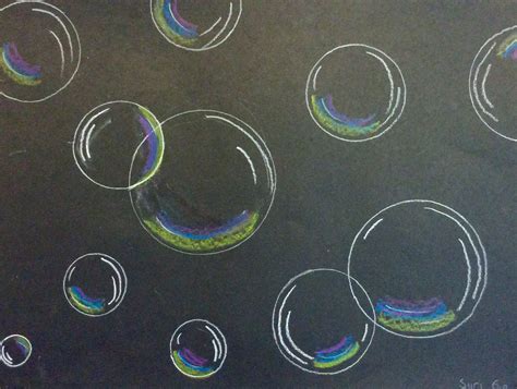 Soap Bubbles Are Drawn On A Black Surface