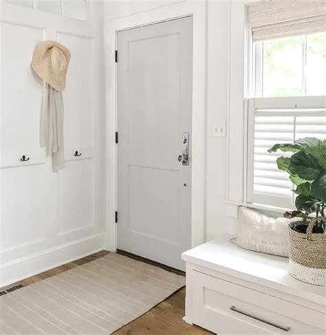 Light Gray Door With White Wood Wall Trim Cottage Entrancefoyer