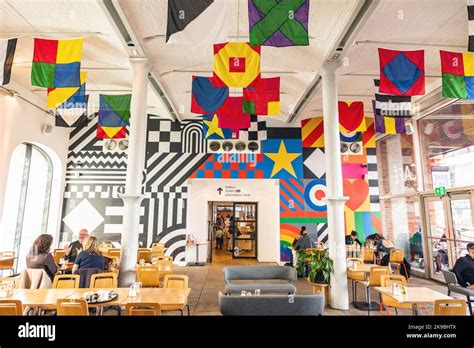 Cafe At Tate Liverpool Art Gallery Featuring Flags And Mural By Sir