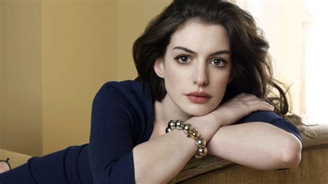 1920x1080 Brunette Anne Hathaway Blue Dress Relaxing Couch Brown Eyes