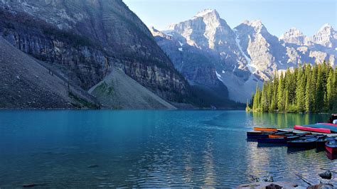 Canoes At Moraine Lake In Banff National Park Alberta Canada