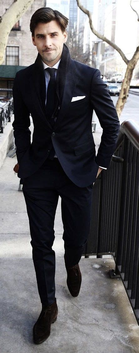 Chelsea boots are the most formal boot, which is why you can pair them with a suit of any color. Black Chelsea Boots With Suit