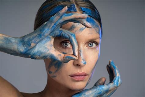Beauty Art Portrait Of Woman With Interesting Abstract Makeup Blue