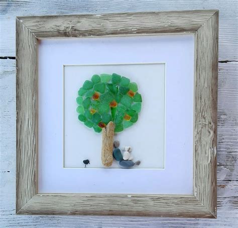 Pebble art tree Sea glass art Beautiful, unusual pebble art picture .. A lonely tree and a man ...