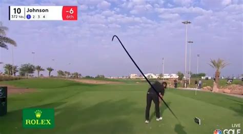 Dustin Johnson Drills A Volunteer With A Tee Shot At Saudi Tournament