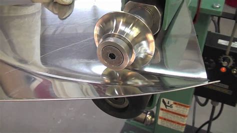 Lazze Metal Shaping Stainless Steel Panel In The Bead Roller Youtube