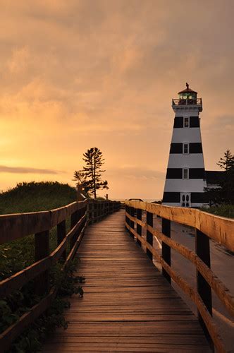 Shoreline West Point Lighthouse Sunset Photo Credit Ju Flickr