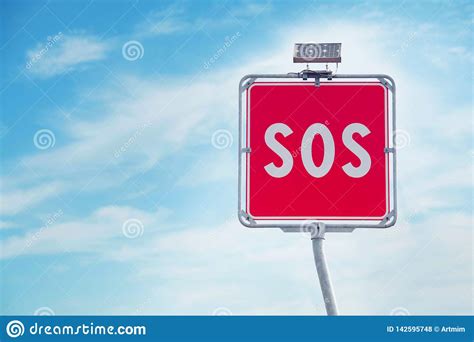 Sos Sign On Blue Sky Background Sos Sign And Phone Box On Highway In