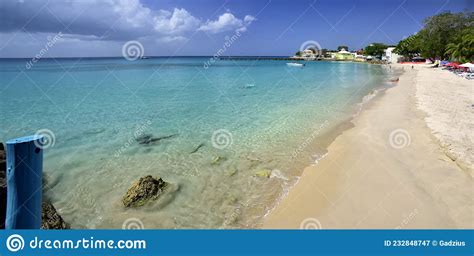 speightstown barbados february 22 2020 people swimming in the ocean in the speightstown town