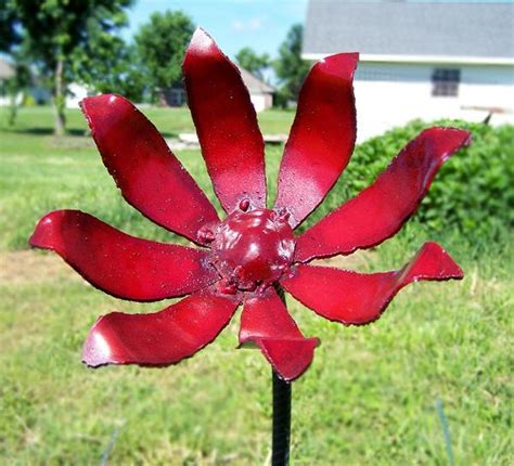 Get outdoors for some landscaping or spruce up your garden! Rustic outdoor yellow flower art - Metal flower stake ...