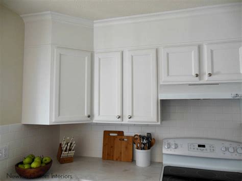 Make it look like you have another row of small cabinets above your existing cabinets by installing a wood background then add matching cabinet doors above each cabinet. Painted Kitchen Cabinets | Painted Kitchen Cabinet Ideas ...