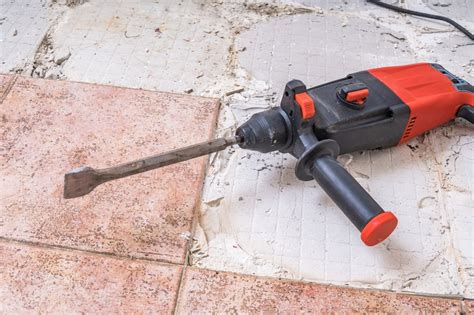 How to remove floor tiles with 18v hammer drill. How To Remove Tile Adhesive | Guide To Removing Adhesive