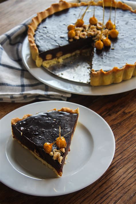 Chocolate And Salted Caramel Tart With Caramel Dipped Hazelnuts Paleo
