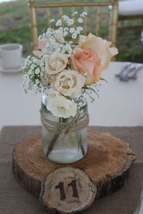 They say the earth laughs in flowers. Tiffany peach roses, majolica spray roses and babies ...