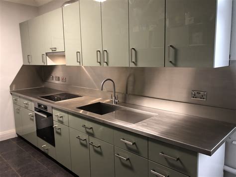 A Stunning Stainless Steel Splashback That Was Fitted Just Above His