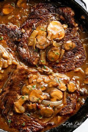 Perfectly grilled steaks topped with blue cheese, mushrooms and caramelized onions. Ribeye Steaks With Mushroom Gravy is simple and delicious ...