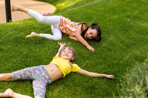 Premium Photo Happy Children Playing Outdoors Children On The Playground