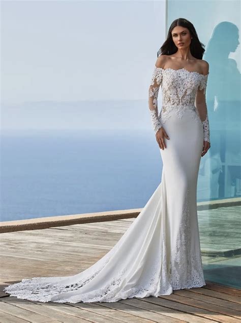 Long Sleeved Mermaid Wedding Dress In Crepe With Wraparound Neckline