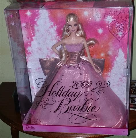 2009 (50th Anniversary) Holiday Barbie from my daughter this Xmas. Added to my collection
