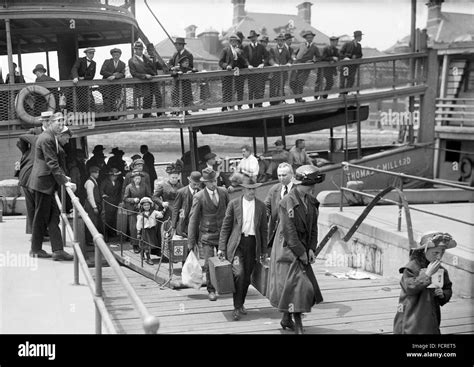 Ellis Island Immigrants Immigrants Disembarking At Ellis Island New