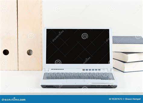 Office Desk With Books Folders And Laptop Stock Photo Image Of