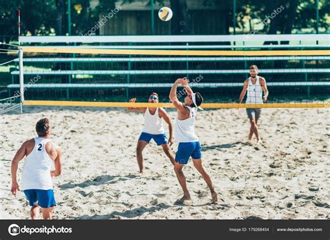 Beach Volleyball Players Game Stock Photo By ©microgen 179268454