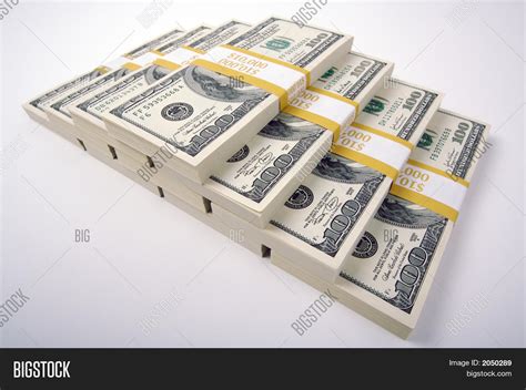 Stacks Of Ten Thousand Dollar Piles Of One Hundred Dollar Bills Stock