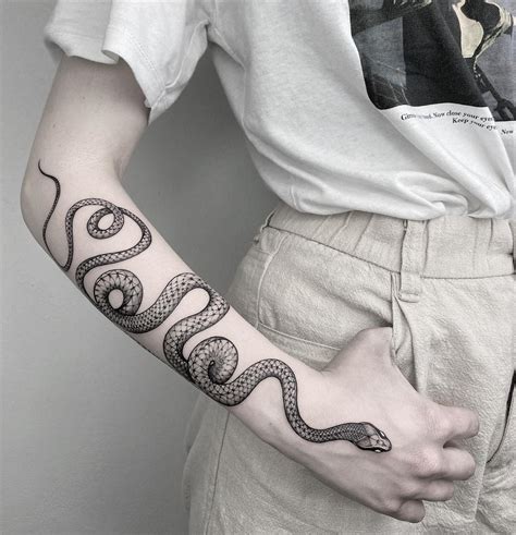 Snake Tattoo Meanings 52 Designs That Take Your Breath Aw