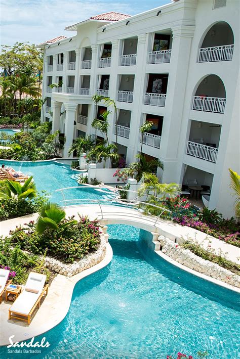 swim up suites along barbados longest lagoon pool at sandals barbados barbados vacation
