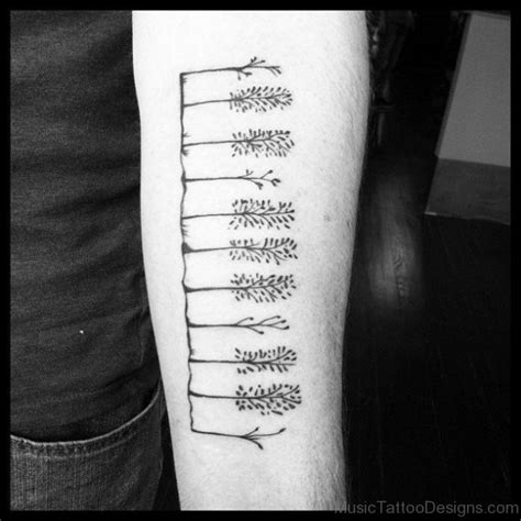 Amazing rainbow music notes and piano keys tattoo on forearm. 80 Stylish Piano keys Tattoos