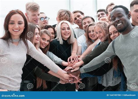 Diverse Young People Putting Their Hands Together Stock Photo Image