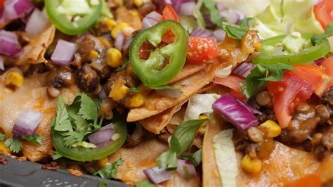 Season with cumin, garlic powder, salt and pepper and sauté until cooked through, breaking up meat into small pieces with a wooden spoon. Loaded Vegetarian Nachos - Healthy Treats