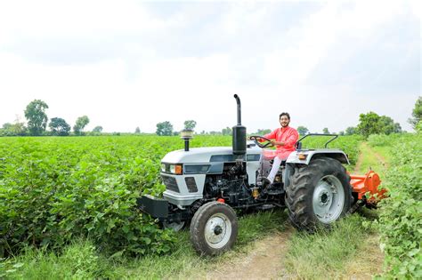 premium photo indian farmer working with tractor at field