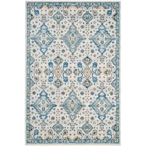 Blue area rugs are known to add color, comfort, and texture to your floors. Safavieh Evoke Ivory/Light Blue 7 ft. x 9 ft. Area Rug ...