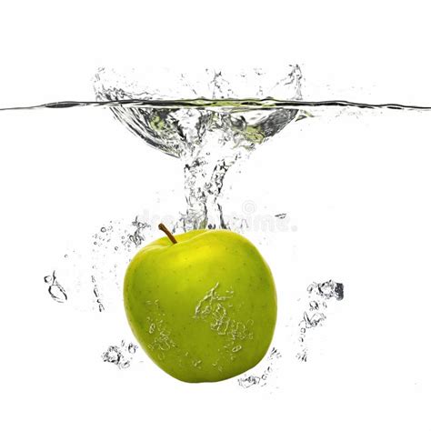Apple Falling Into The Water With Splash On White Stock Photo Image
