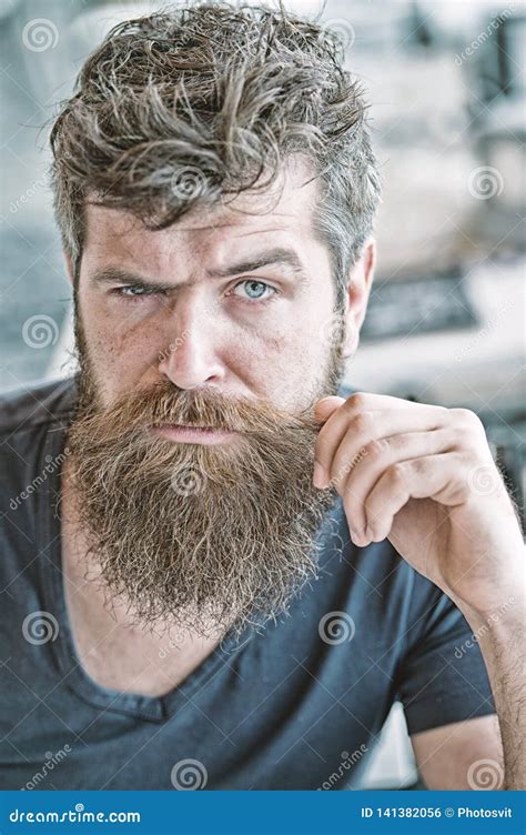 Hipster Brutal Guy Twisting Mustache Man Confident Brutal Bearded Macho Grooming And Barber