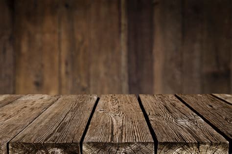 Download table top with background for free. Empty Wood Table With Dark Vertical Table Background Stock ...