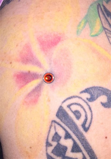 Dermal Piercing In My Arm With My Yellow Flower Tattoo Yellow Flower Tattoos Paw Print Tattoo