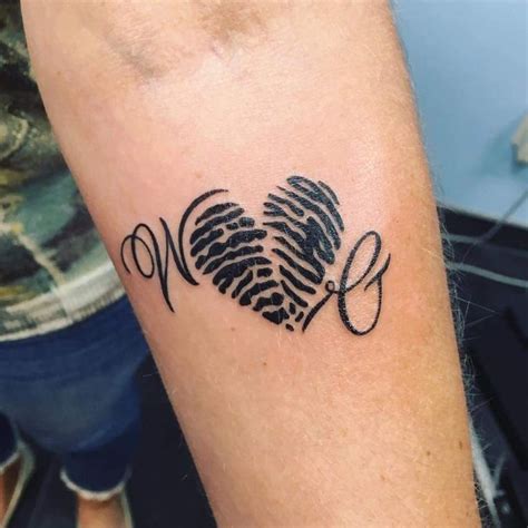 Pin By Suzanna On T Tt00s Fingerprint Tattoos Couples Tattoo Designs Fingerprint Heart Tattoos