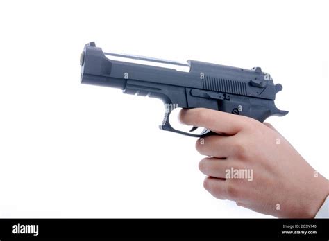 Hand Holding Pointing Toy Gun Hi Res Stock Photography And Images Alamy