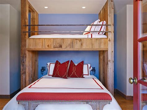 This is an example of a small traditional bedroom in london with white walls, blue floors and feature lighting. 15 Small Guest Room Ideas with Space-Savvy Goodness