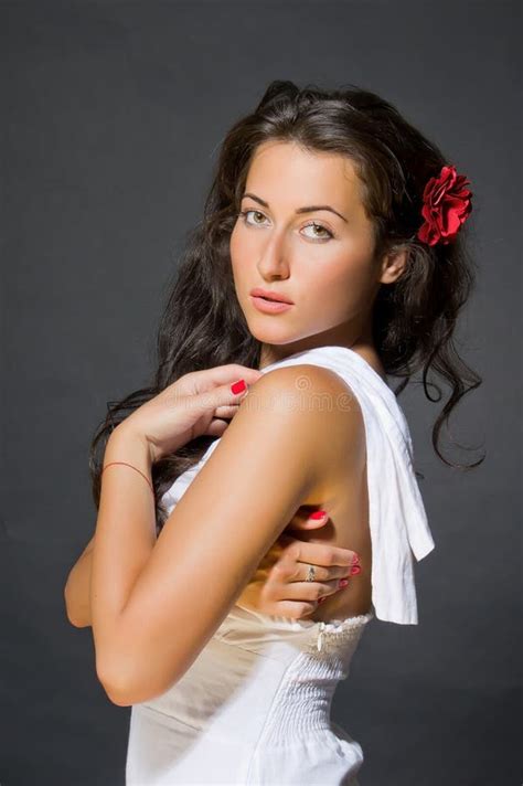 Young Dark Skinned Woman Dressed In Casual Clothes In The Mall Stock