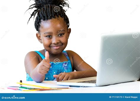 African Kid Doing Thumbs Up At Desk Isolated Stock Image Image Of