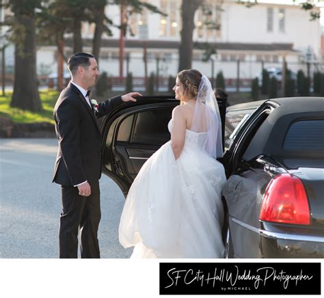 Groom Helps His Bride Into The Limousine At The Palace Of Fine Arts Wedding Photography At Sf