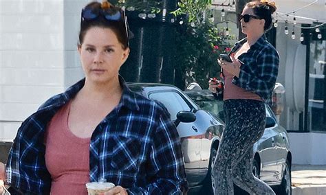 Lana Del Rey Bares A Glimpse Of Her Midriff While Picking Up Lunch And An Iced Coffee In Studio