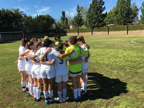 Soccer Team Huddle