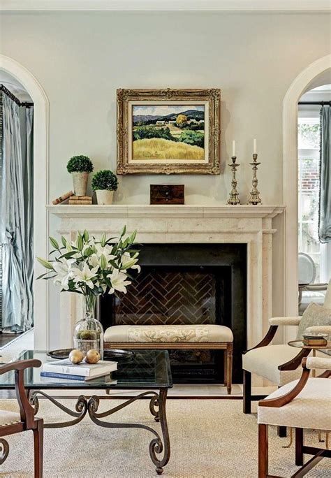 Contemporary Living Room Sitting Area Around A Fireplace Cream Colors