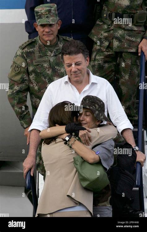 Former Hostage Ingrid Betancourt Bottom Right Embraces Her Mother