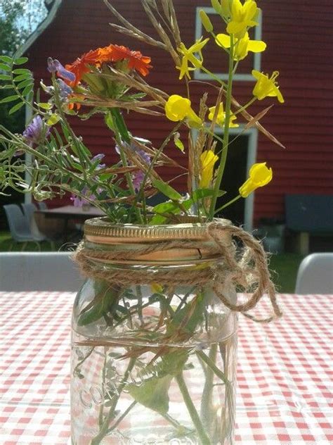 Decorate the corners of the room with tall, dried corn stalks. Barn dance table centerpiece | Barn dance decorations ...
