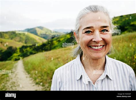 Caucasian Woman Standing On Hiking Trail Stock Photo Alamy